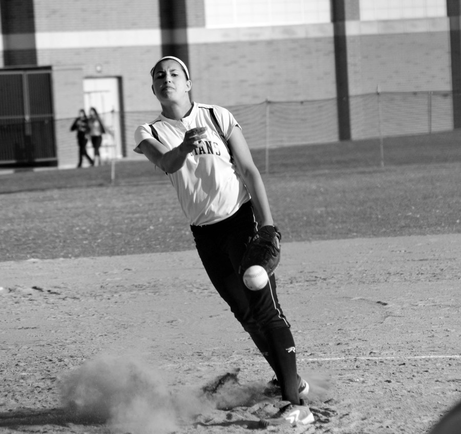 Senior Jenny McTague delivers a pitch against Glenbrook South on April 4. McTague earned the win on one hit and four strikeouts. Photo by Gabe Weininger.