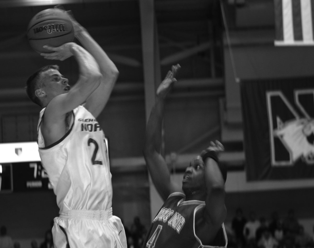 GBN alumnus Jon Scheyer (‘06) goes up for a jump shot in a game against Lawrence North High School. Scheyer led GBN to a state title in 2005. Torch file photo.