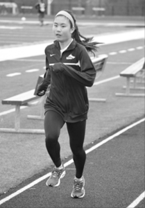 Junior Dana Lee practices long distance running for outdoor track on May 1. Lee was preparing for the New Trier Relays that took place on Saturday May 3. Lee has been training all season for State which begins May 22. Photo by Gabe Weininger.