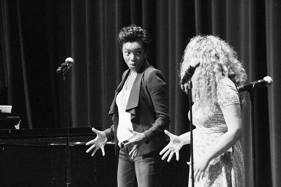 Broadway performer Heather Headley (left) demonstrates stage presence using body language with senior Katie Snyder, lead in the Glenbrook musical “Aida.” Headley visited the “Aida” cast in the CPA on March 21. Photo by Alec Mawrence.