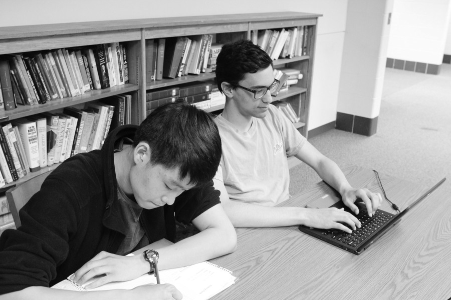 Students choose alternative ways to study in the MRC. Studies show that students retain more information when handwriting notes instead of using technology. Photo Illustration by Kobi Weinberg.