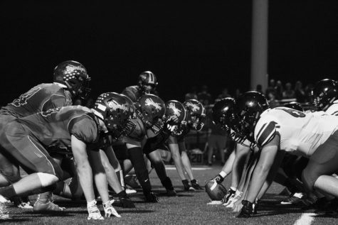Glenbrook North faces off against Highland Park in a game on Sept. 23. This marked the first time the new Hate Speech Protocol was in effect during a football game at GBN. Photo by Emily Chwa.