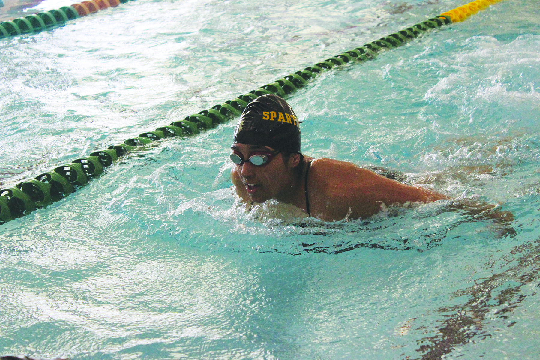 At an afternoon swim practice on Sept. 8, junior Sarah Chinwalla does the butterfly stroke to warm up. Iron is essential in an athlete’s diet as it can benefit athletic performance. 