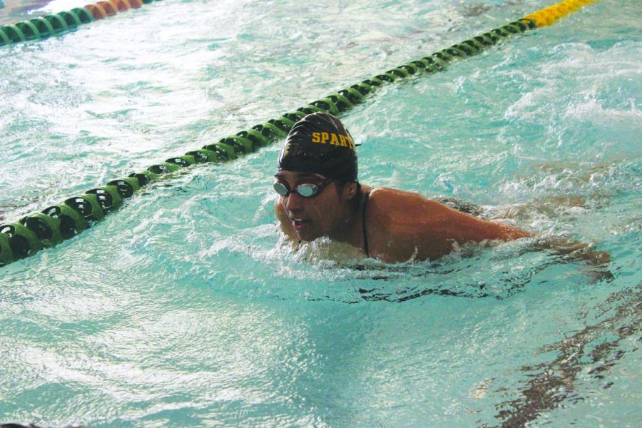 At an afternoon swim practice on Sept. 8, junior Sarah Chinwalla does the butterfly stroke to warm up. Iron is essential in an athlete’s diet as it can benefit athletic performance. Photo by Karsten Konstant