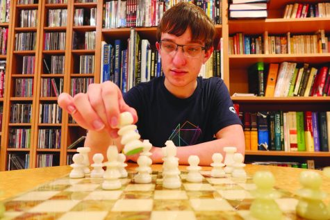 Senior Ben Witzel has played chess competitively since freshman year. The chess team practices on Fridays after school in the Math Resource Center and competes on Saturdays. Photo by Noah Kaufman