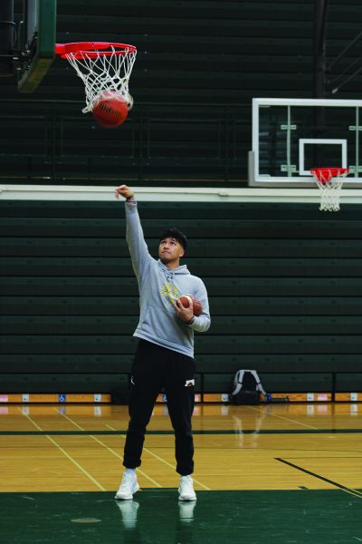 Senior Raj Selvaraj plays football and basketball. He has noticed the skills he has aquired from both sports transfer to the other, which improves his overall athleticism. Photo by Lara White