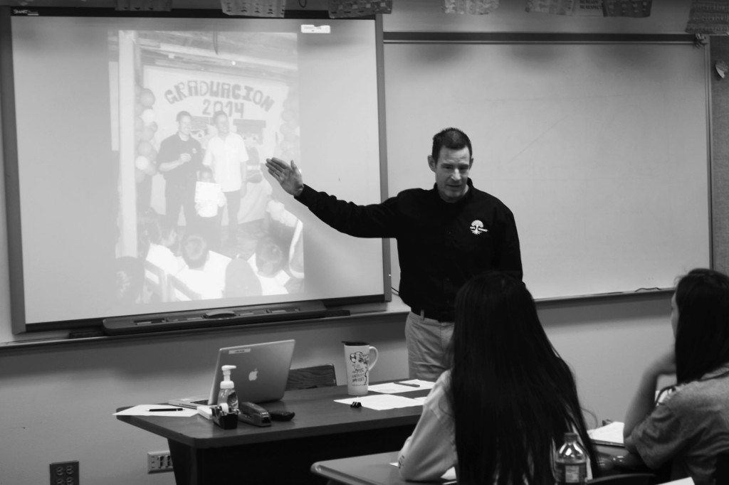 Ware speaks to his Spanish class about working with Hope Renewed International. He presented about an event in which he handed out diplomas to recently graduated students in Guatemala. Photo by Roshan Modi.