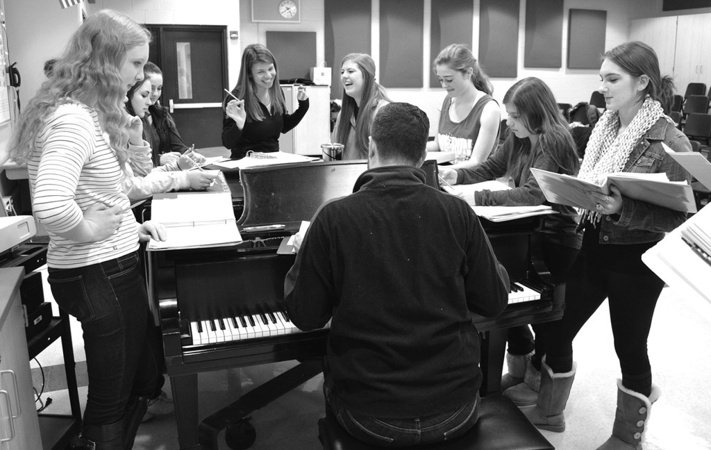 Members of Fermata Nowhere rehearse on Tuesday Jan. 6 for the upcoming Variety Show. This extracurricular choir recorded a short parody that aired on Monday Night Football prior to a Chicago Bears game. Photo by Gabe Weininger