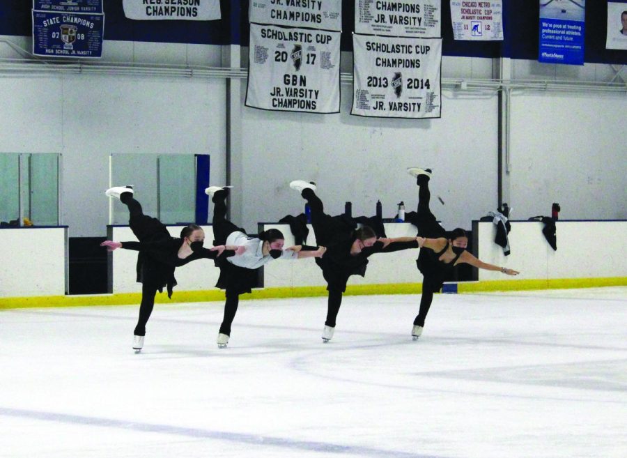 The Junior Teams Elite practices at Northbrook Sports Center for their National and World Championship competitions in March. Eight of the team’s 20 skaters are Glenbrook North students  and represent the United States at international competitions. Photo by Claire Satkiewicz