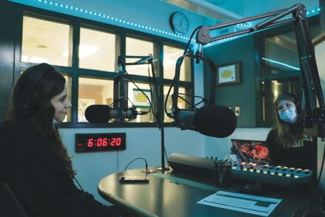 During her radio show on March 10, sophomore Katelyn Plasky (right) hosts freshman Amalya Walny as a guest. Radio students have prepared for WGBK Radiothon, which is scheduled to take place on April 22. Photo by Alex Garibashvily.
