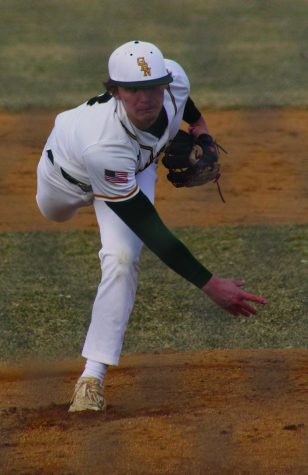 Pitching in the season opener against Holy Trinity on March 17, senior Dylan Bass threw eight strikeouts in 3.2 innings, only allowing one hit. Bass is committed to play Division II baseball at the University of Tampa. Photo by Jiya Sheth
