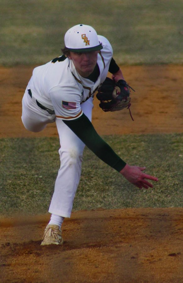 Pitching in the season opener against Holy Trinity on March 17, senior Dylan Bass threw eight strikeouts in 3.2 innings, only allowing one hit. Bass is committed to play Division II baseball at the University of Tampa. Photo by Jiya Sheth