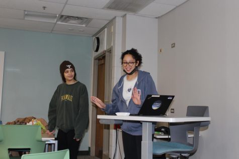 Black Student Union members senior Lexi Singer (left) and sophomore Imelia Thompson discuss AP African American Studies in a meeting on March 14.  Photo by Marissa Fernandez.