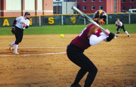 Freshman Kate Nelson throws a pitch in a home game against Zion-Benton on March 20. Nelson had nine strikeouts in the game, and she is one of seven freshman on the team. Photo by Kate Leverenz