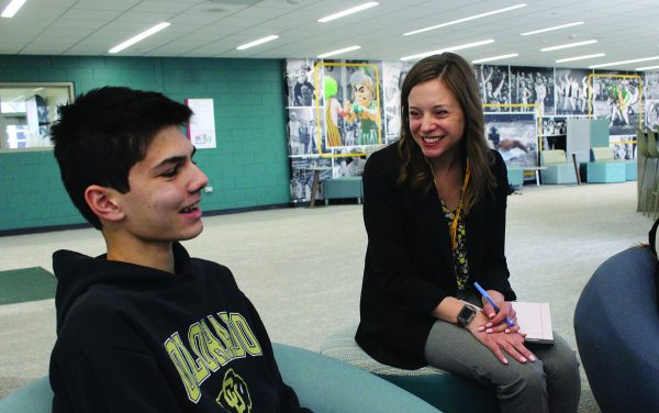 New principal Mandy Hughes talks with sophomore John Sellas while visiting Glenbrook North. Hughes was appointed principal on Jan. 22 for the upcoming school year.
Photo by Karsten Konstant