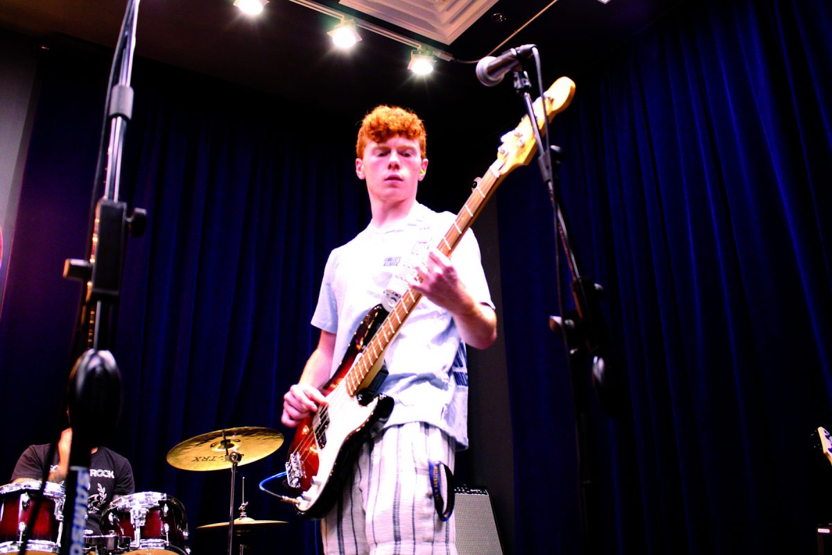 Senior Mike Eichstadt rehearses at Glenbrook School of Rock on Sept. 2. Eichstadt has been playing bass guitar for the school’s show team for four years and has performed at Summerfest three times.