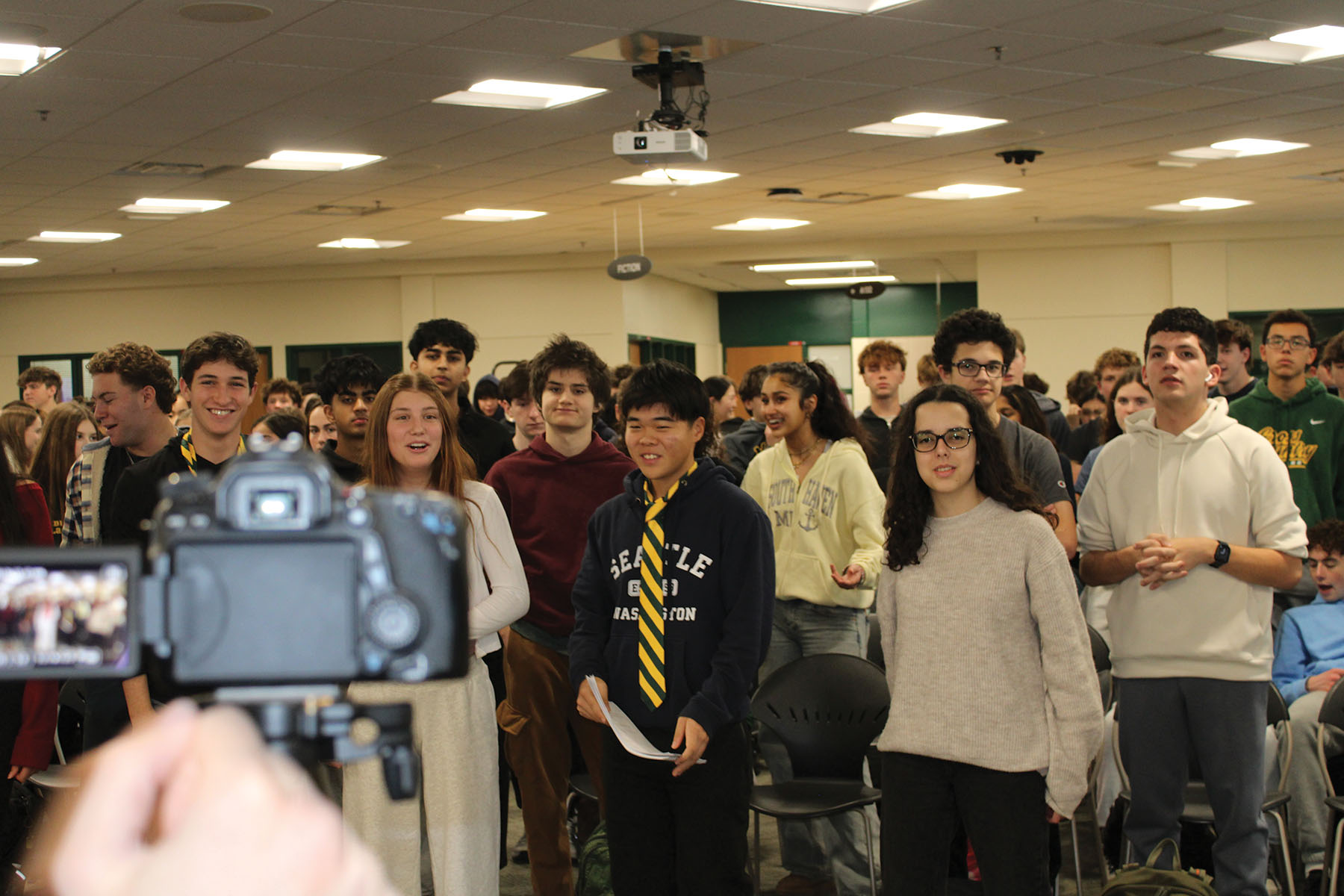 DECA members sing a portion of the Spartan Fight Song at a meeting on Nov. 6. Senior Lexx Malkin felt very grateful to be a part of the DECA community that came together to show school spirit. The video is intended to promote student unity and is scheduled to air at the Loyalty Day Assembly on Jan. 24.