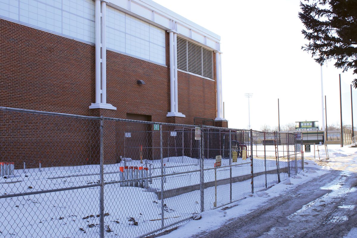 As part of the Guaranteed Energy Savings Project, two Tesla batteries are being installed outside of the fieldhouse. After the initial cost is recouped, the batteries are expected to bring in about $500,000 to District #225 annually.