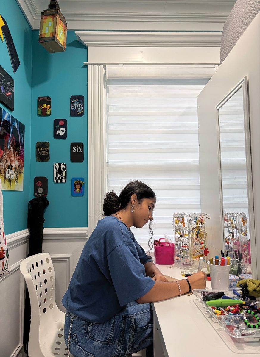 Torch Editor Hannah Varkey creates homemade room decorations by drawing on pieces of cardboard. To defy monotony and break free from repetitive habits, students should pursue spontaneity.